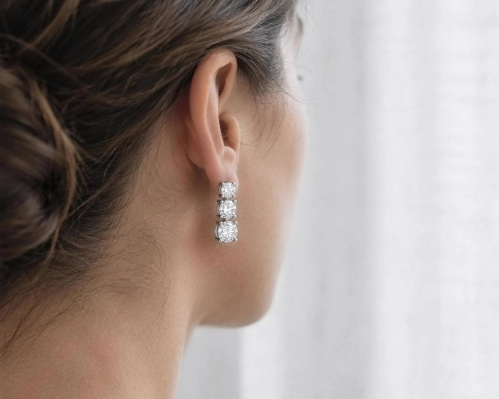 Orecchini trilogy in argento indossati